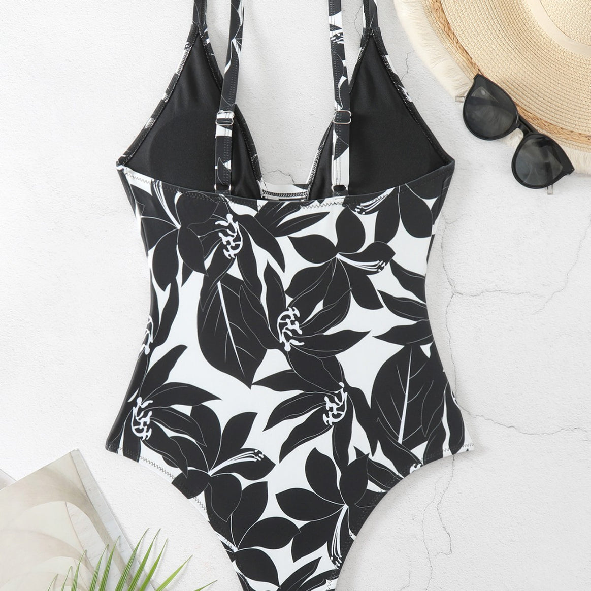 Women's one-piece bathing suit with elegant floral design and modern V-neck Mune Fashion