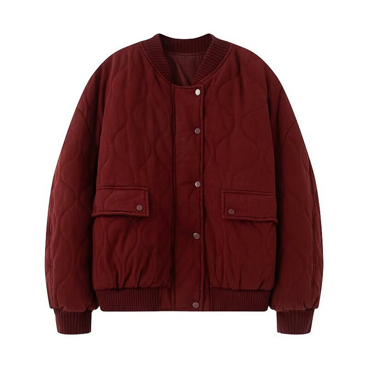 Women's quilted bomber jacket with oversized silhouette, ribbed cuffs, and flap pockets Mune Fashion