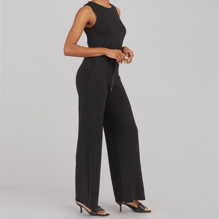 Women's sleeveless knitted jumpsuit with wide palazzo legs, drawstring waistband, and patch pockets Mune Fashion