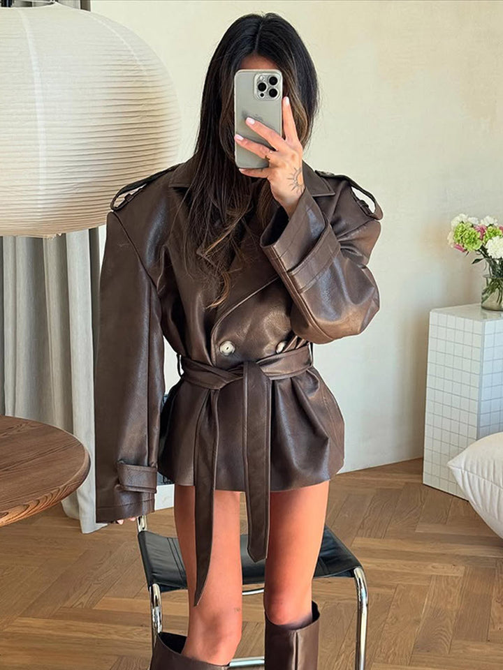 Women's short jacket made of faux leather with waistbelt and oversized shoulder area Mune Fashion