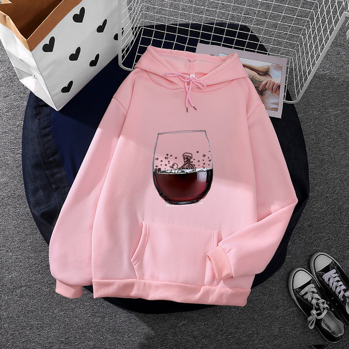 Women’s casual hoodie with photorealistic wine glass graphic, kangaroo pocket, and soft fleece Mune Fashion
