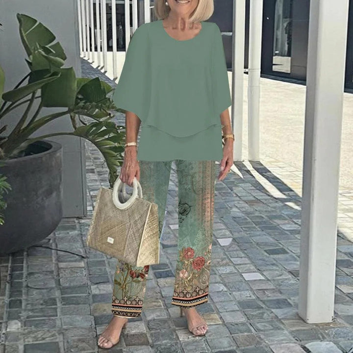 Women's layered tunic with cape sleeves and ankle-length straight leg pants with graphic print Mune Fashion