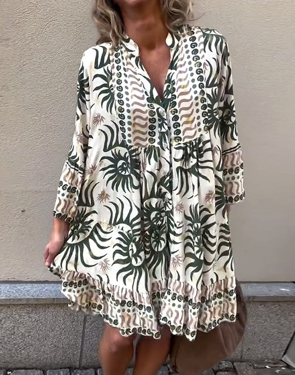 Women’s knee-length Boho tunic dress with V-neck, gathered empire seam, and ruffled hem Mune Fashion