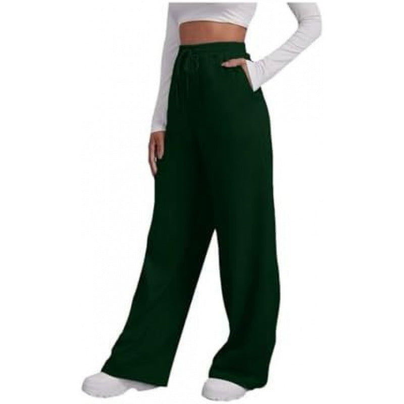 Women's flowing high-waist palazzo lounge pants made of lightweight jersey with elastic waistband and practical side pockets Mune Fashion
