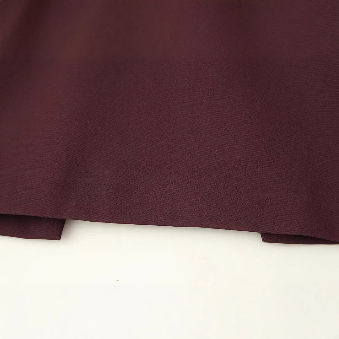 Women’s top with capelet overlay and fitted peplum silhouette Mune Fashion