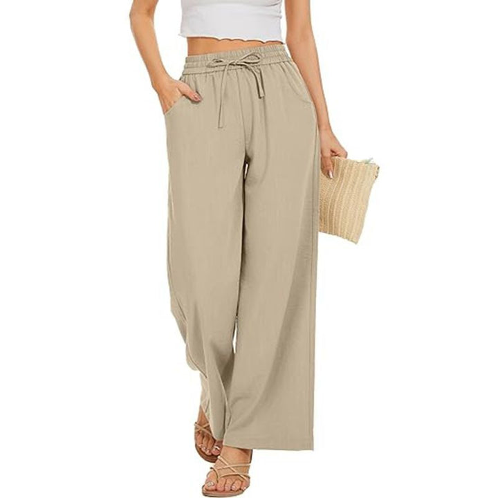 Women's wide linen pants with high elastic waistband, drawstring, and side pockets Mune Fashion