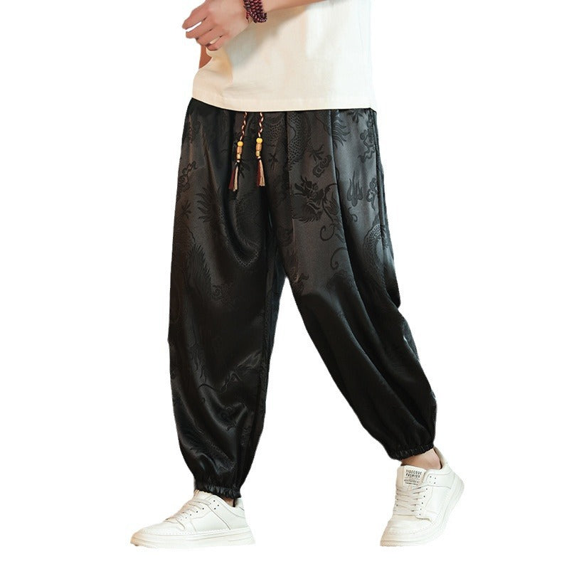Men's wide Jacquard satin harem pants with drawstring, elastic cuffs, and traditional dragon motif Mune Fashion