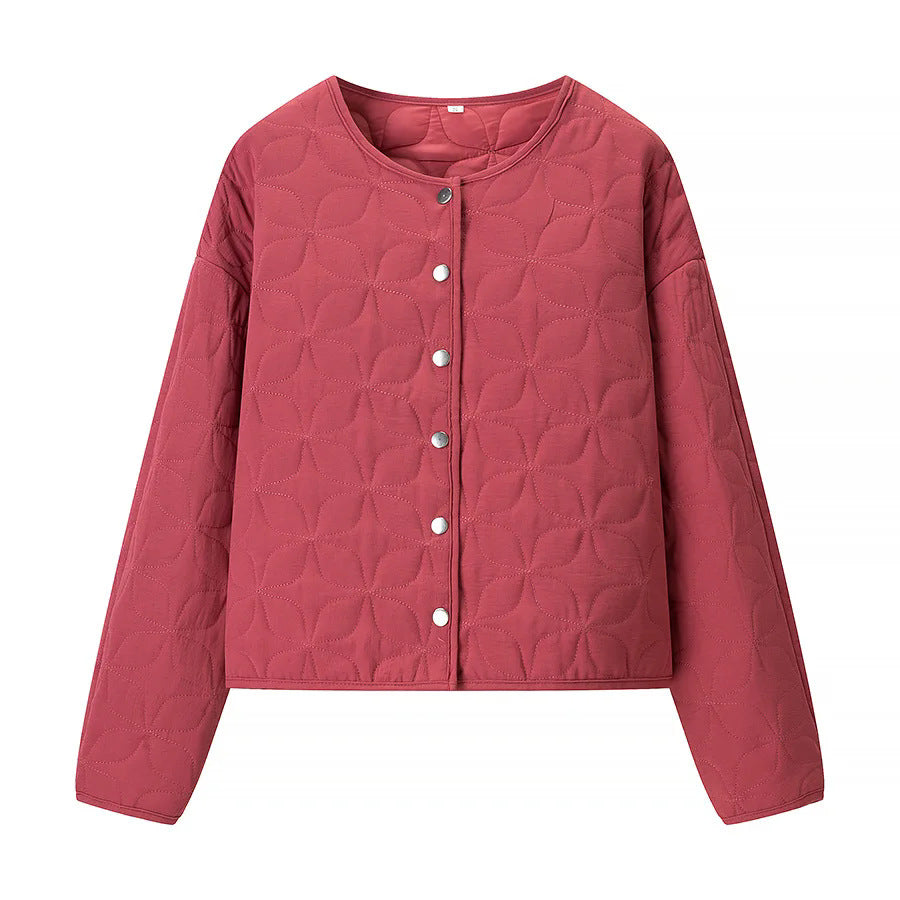 Women's quilted boxy transitional jacket with floral quilted texture, lightly padded inner lining and press stud placket Mune Fashion
