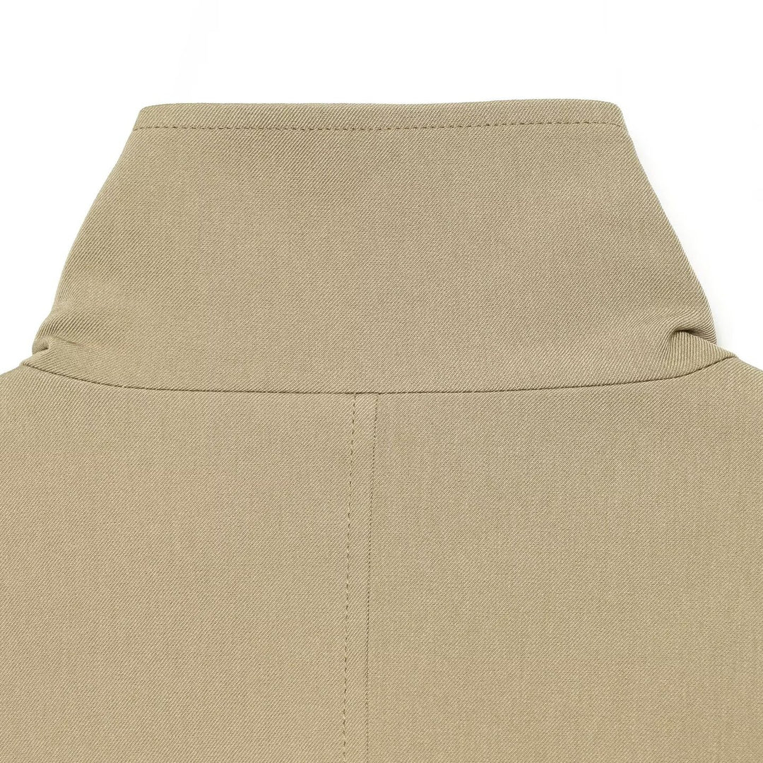Women's short trench coat in lightweight gabardine style with asymmetrical button closure and tie belt Mune Fashion