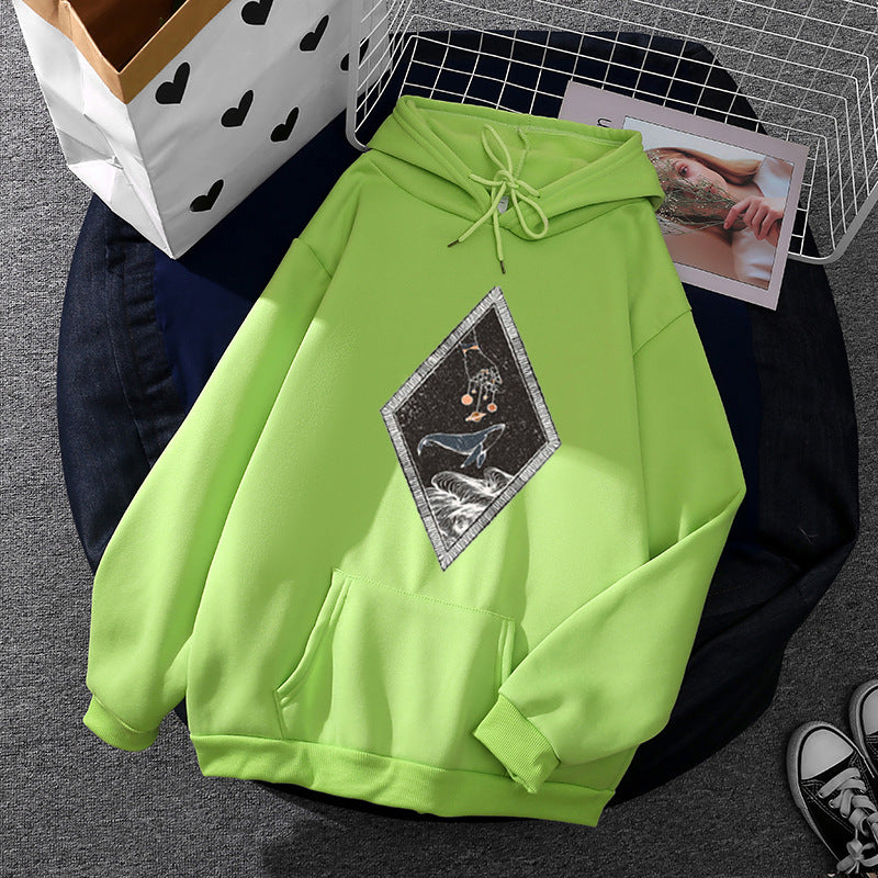 Women's oversized hoodie with sewn whale patch application, kangaroo pocket, and fleece-lined interior Mune Fashion