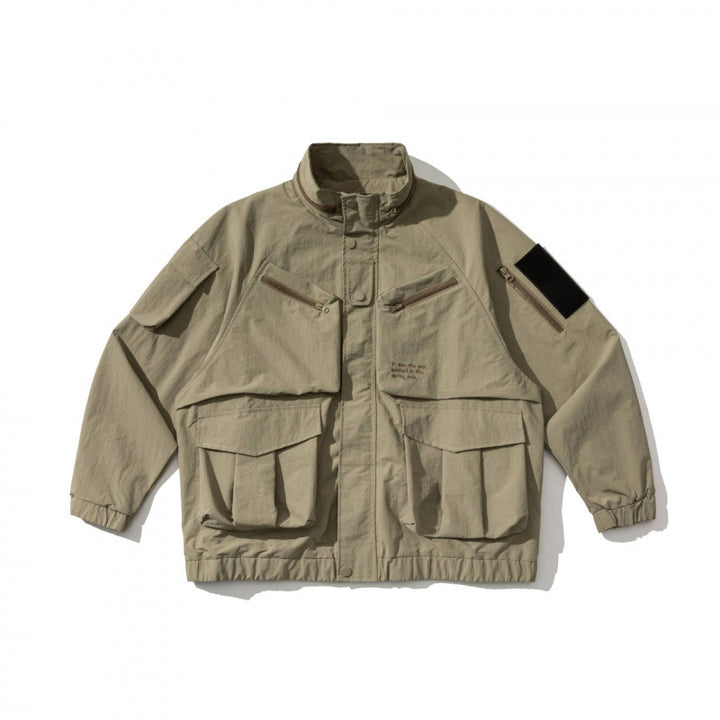 Unisex Oversize Utility Jacket with multifunctional pockets, high stand-up collar, and elastic hem Mune Fashion