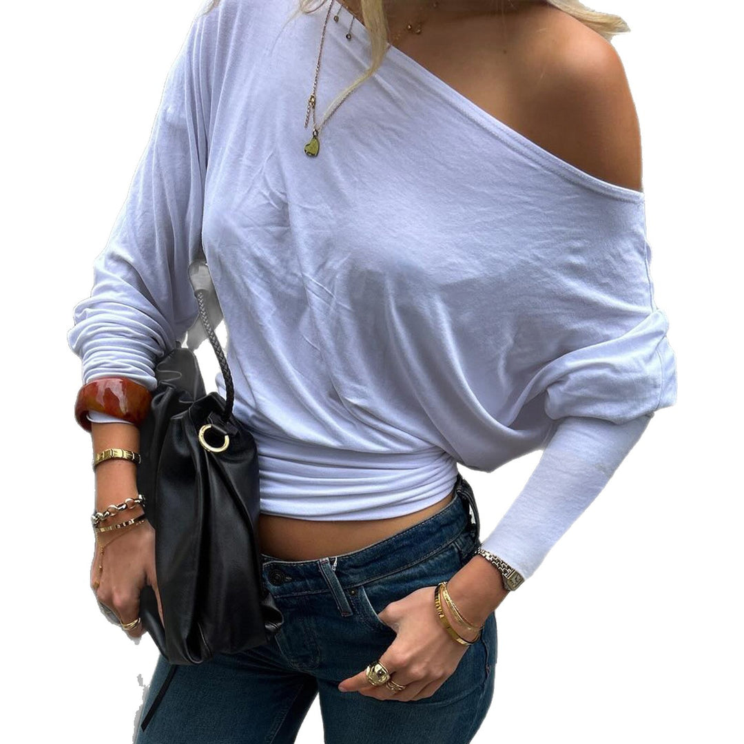 Ladies off-shoulder long sleeve shirt with tailored comfort waistband, ruffled shoulders and figure-hugging fit Mune Fashion