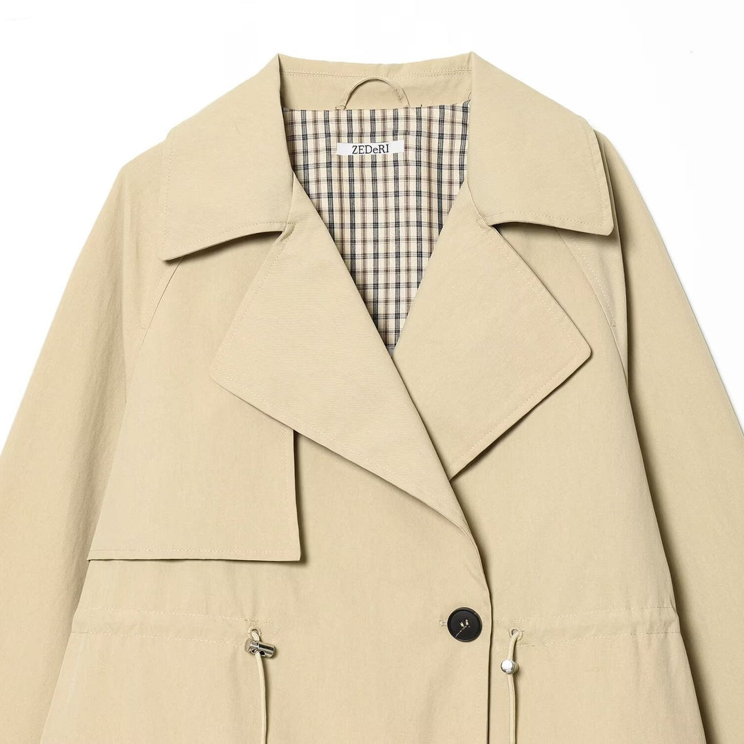 Women's Short Oversized Trench Coat with Drawstring Waist and Wide Lapels Mune Fashion