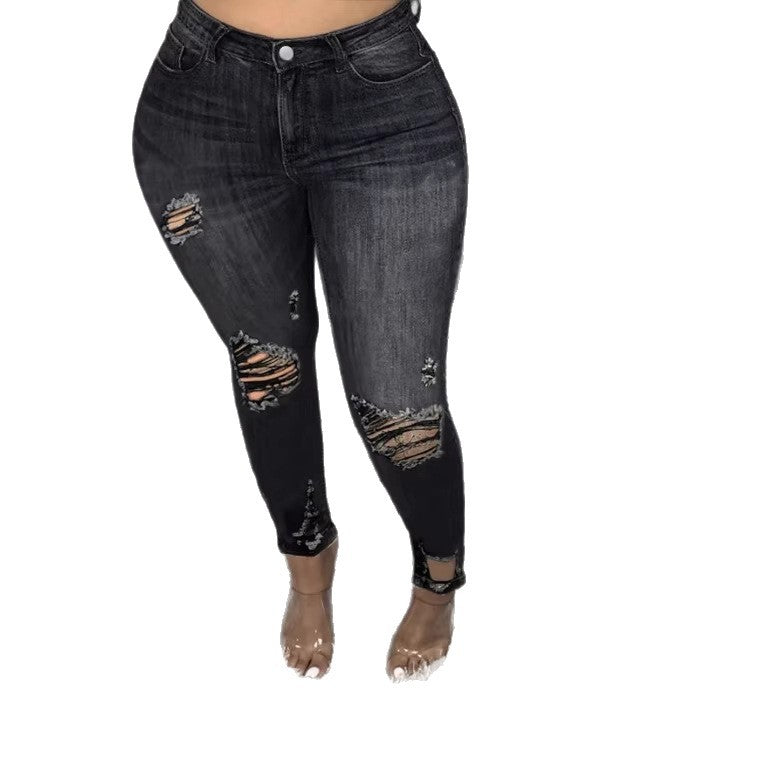 Women high-waisted shapewear skinny jeans with asymmetric rips and ankle-length cut Mune Fashion