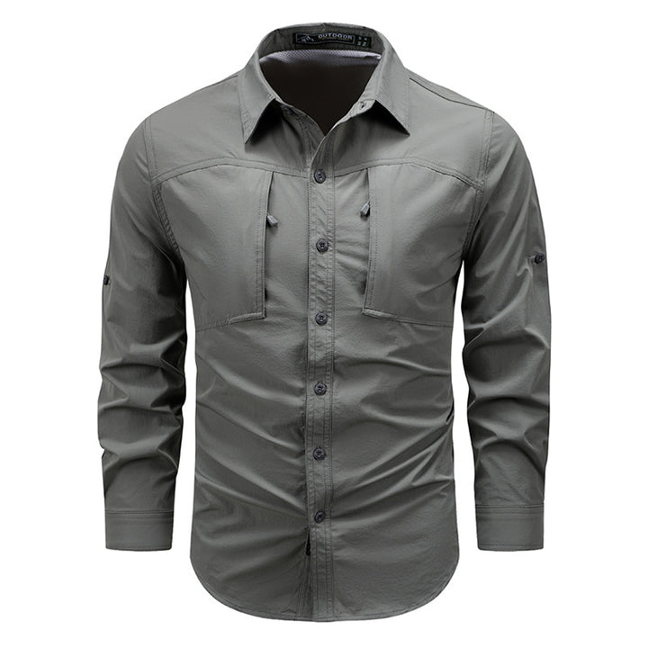 Men's lightweight technical outdoor shirt with roll-up sleeves, chest pockets, and breathable ripstop fabric