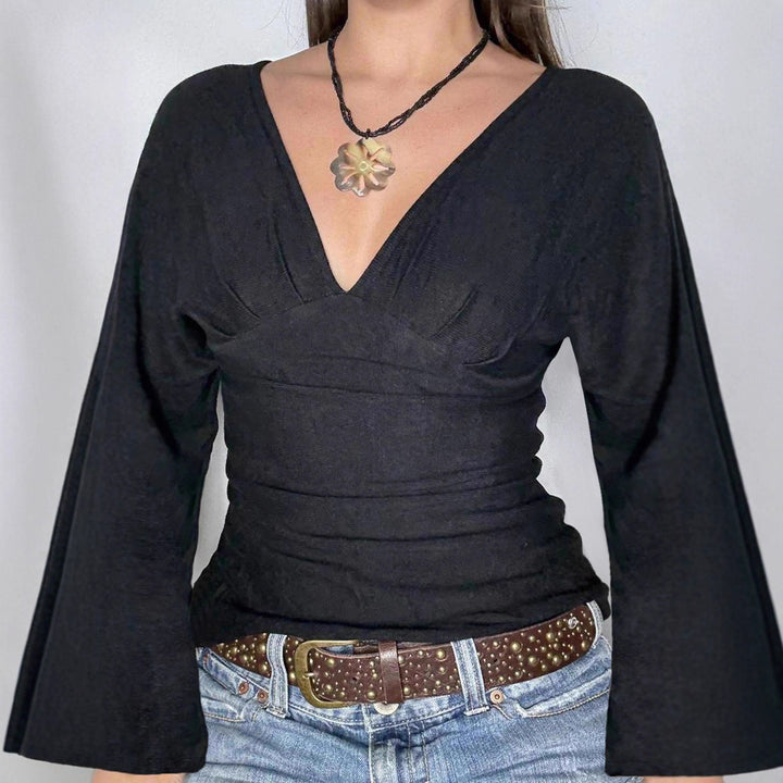 Women's figure-hugging long-sleeve top with deep V-neckline, neck tie for binding, and tailored silhouette Mune Fashion