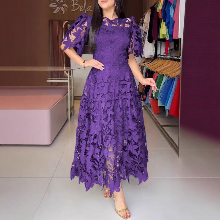 Women's maxi dress made of floral guipure lace with a fitted silhouette and tiered hem Mune Fashion