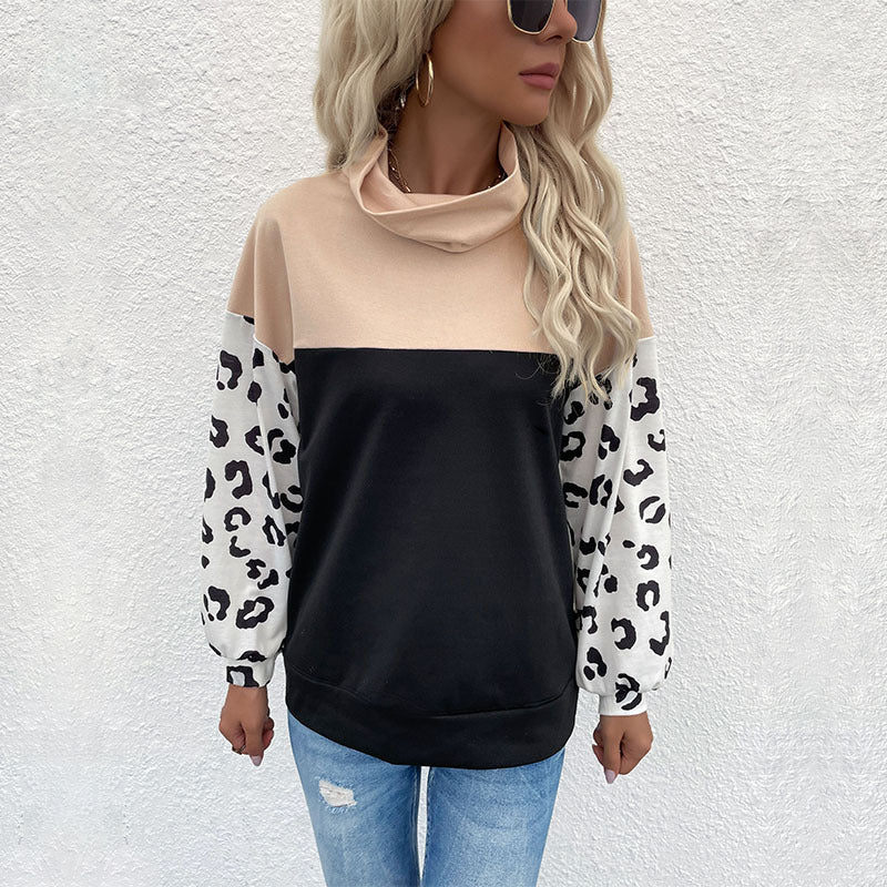 Women's colorblock sweatshirt with rollover collar and animal print sleeves Mune Fashion
