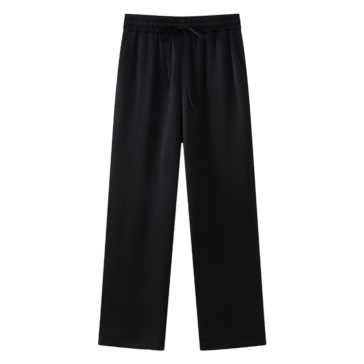 Women's wide pleated pants with elastic waistband, drawstring and side pockets Mune Fashion