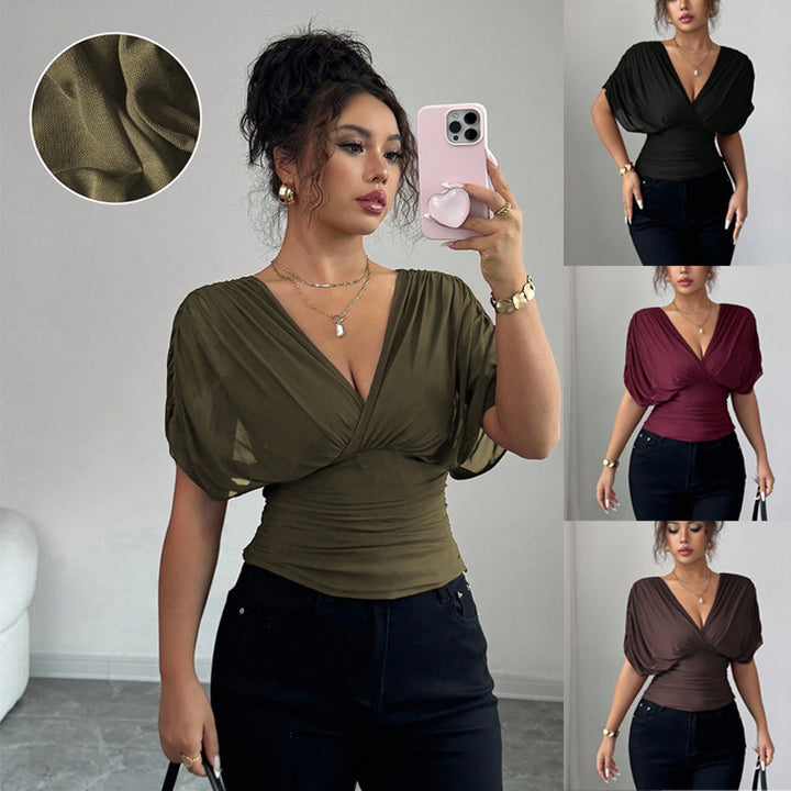 Women's fitted wrap top with deep V-neck and gathered wing sleeves Mune Fashion