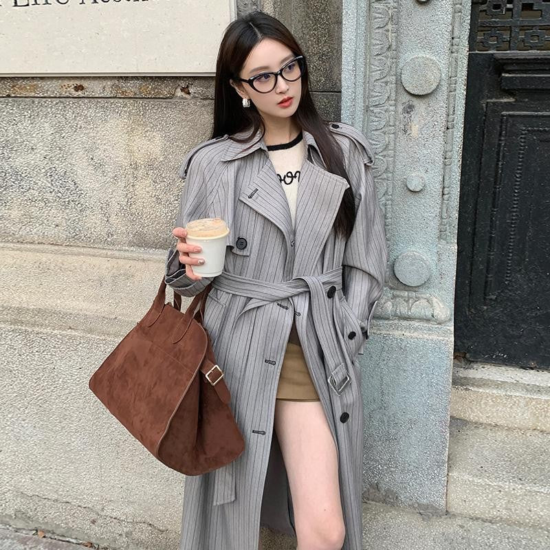 Women’s Long Pinstripe Trench Coat with Tie Belt Shoulder Straps and Flared Hem Mune Fashion