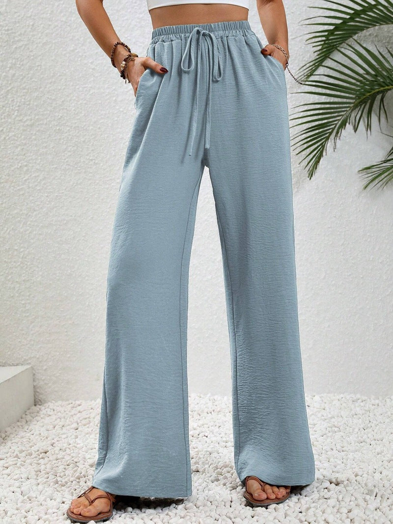 Ladies lightweight, loose-fitting beach pants with elastic waistband, drawstring and side pockets Mune Fashion