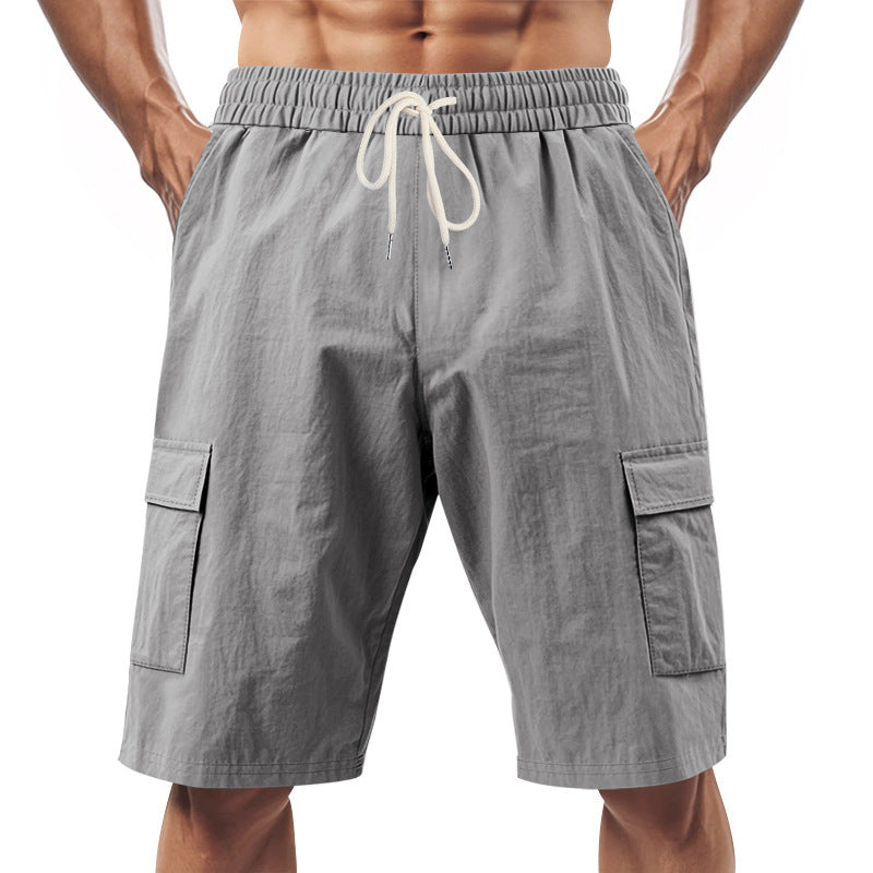 Men's technical cargo shorts with elastic drawstring waistband, secure flap pockets, and quick-drying functional material Mune Fashion