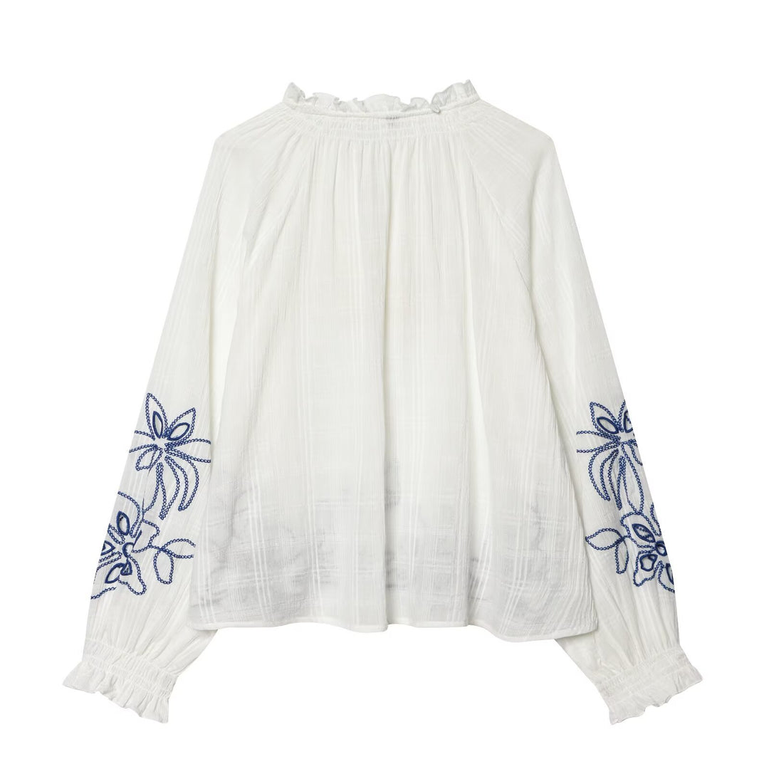 Women's embroidered cotton tunic with ruffle collar, smocking details and tie band