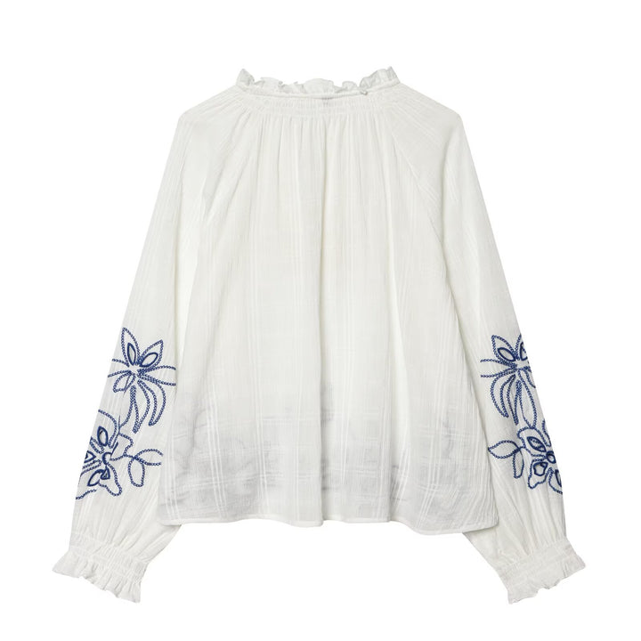 Women's embroidered cotton tunic with ruffle collar, smocking details and tie band