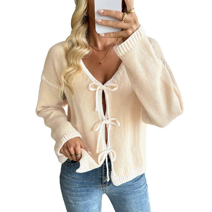 Ladies knitted cardigan with bow closure and deep V-neck Mune Fashion
