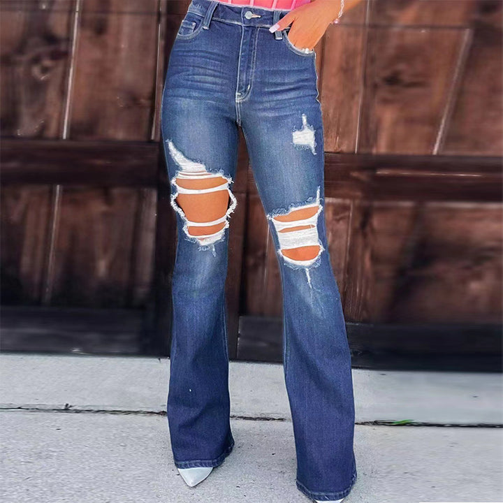 Women's nan high waist jeans with flared leg and heavy distressing at the knees Mune Fashion