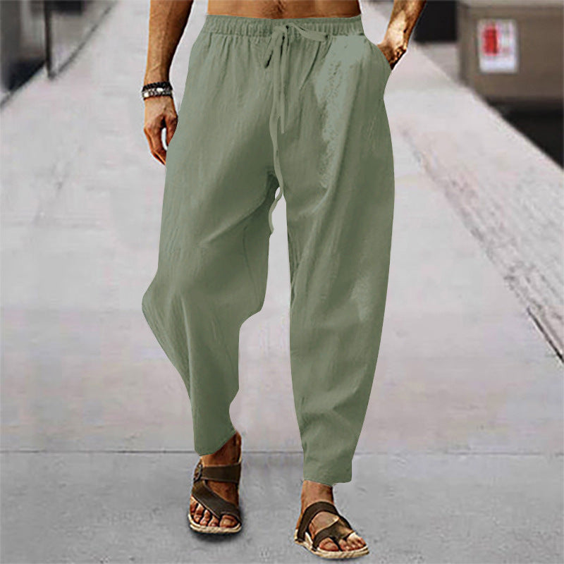 Men's relaxed summer slouch pants made of linen blend with elastic waistband and tapered ankle cuffs Mune Fashion