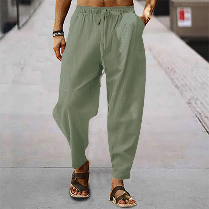 Men's relaxed summer slouch pants made of linen blend with elastic waistband and tapered ankle cuffs Mune Fashion