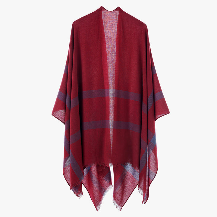 Women’s lightweight fine knit cape with diagonal contrasting stripes and fringes Mune Fashion