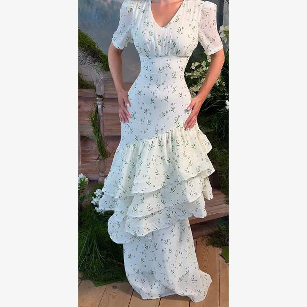 Women’s maxi dress in vintage-romantic style with asymmetric ruffles and puff sleeves Mune Fashion