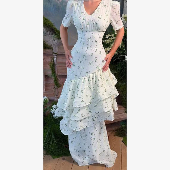 Women’s maxi dress in vintage-romantic style with asymmetric ruffles and puff sleeves Mune Fashion