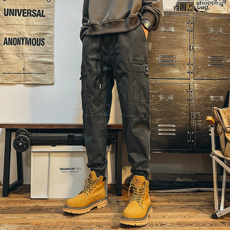 Men's cargo jogger pants with large flap pockets, elastic waistband, and ribbed cuffs Mune Fashion