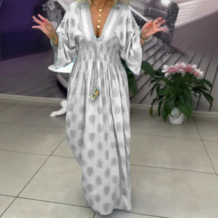 Women's gathered maxi dress with smocked waist, kimono sleeves, and decorative tassel Mune Fashion