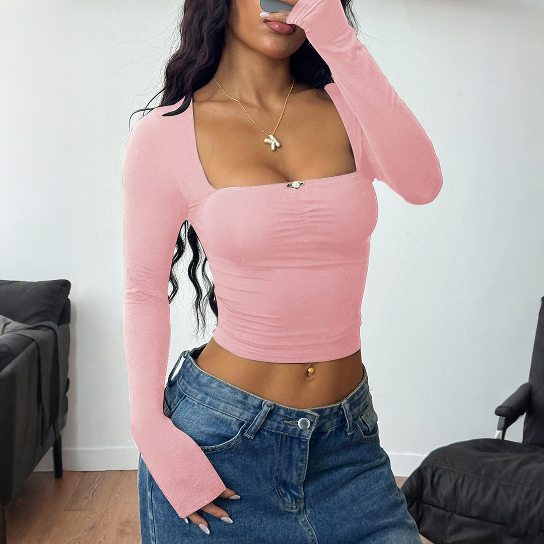 Women’s tailored long-sleeve cropped top with square neckline, figure-hugging fit and delicate decorative button detail Mune Fashion