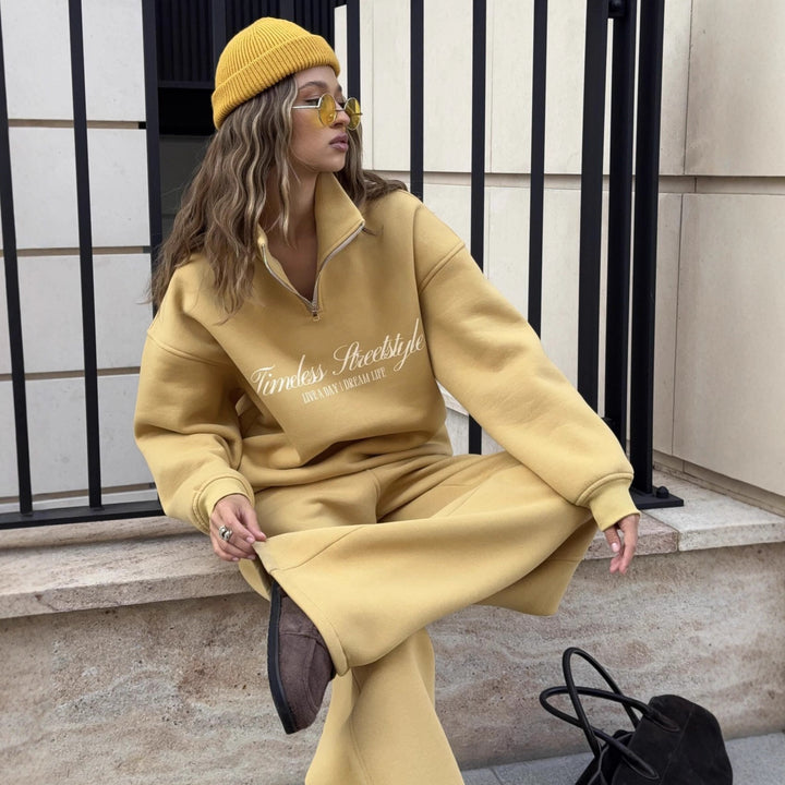Women's oversized half-zip sweatshirt with high stand collar and statement print Mune Fashion