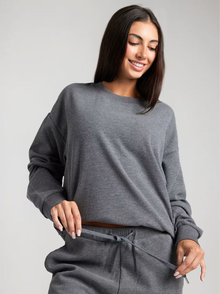 Ladies spacious waffle knit loungewear set with round neck and drawstring pants Mune Fashion