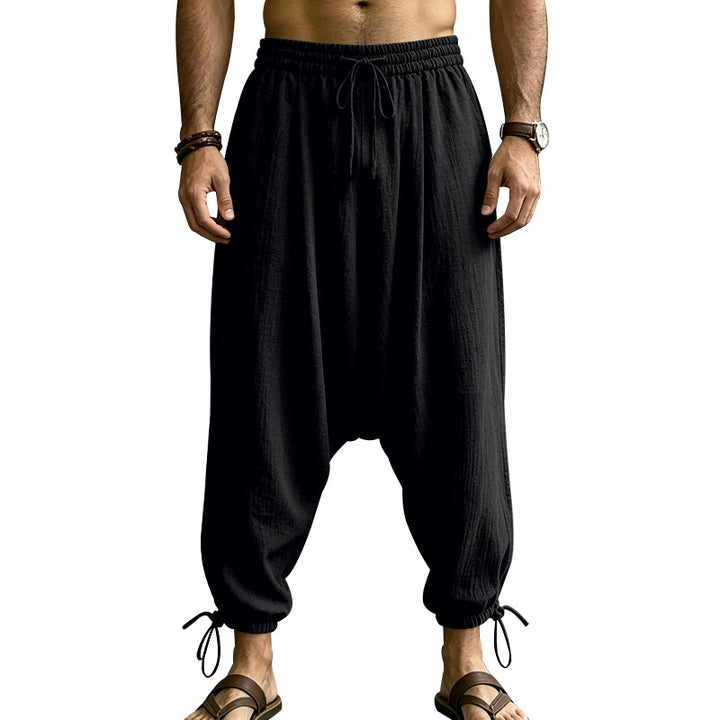 Men's harem pants with a low crotch, elastic waistband, and adjustable ankle cuffs Mune Fashion