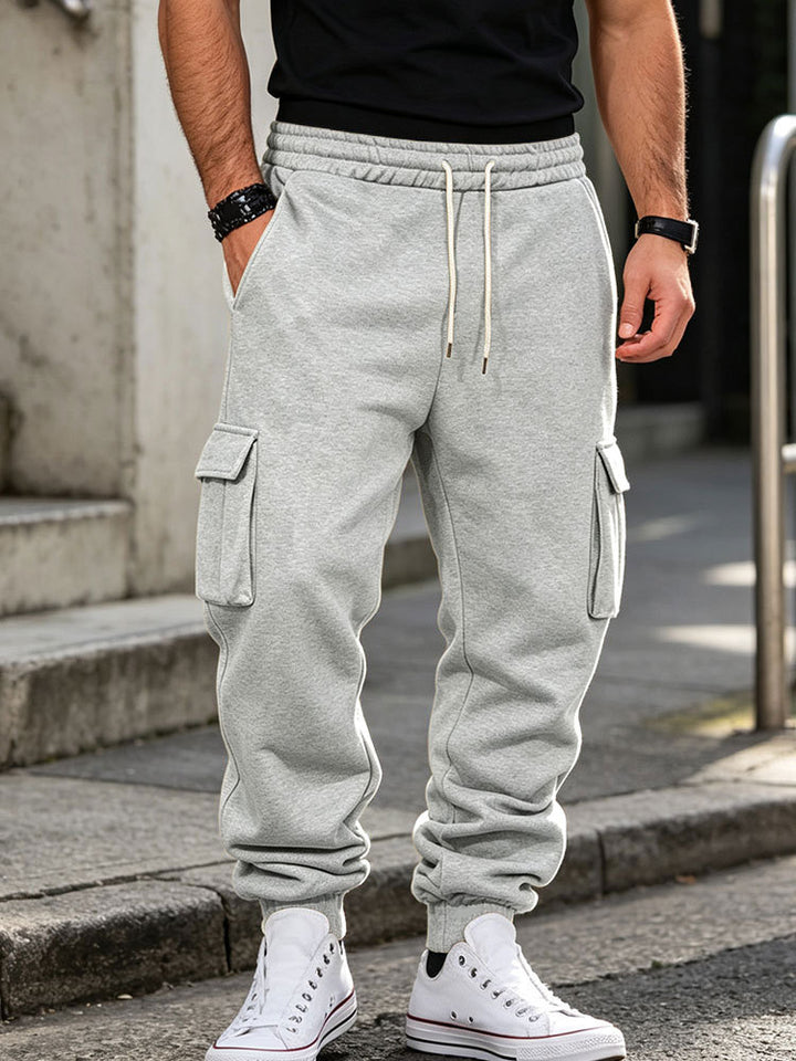Men's cargo jogging pants made of cotton fleece with elastic waistband and leg cuffs Mune Fashion