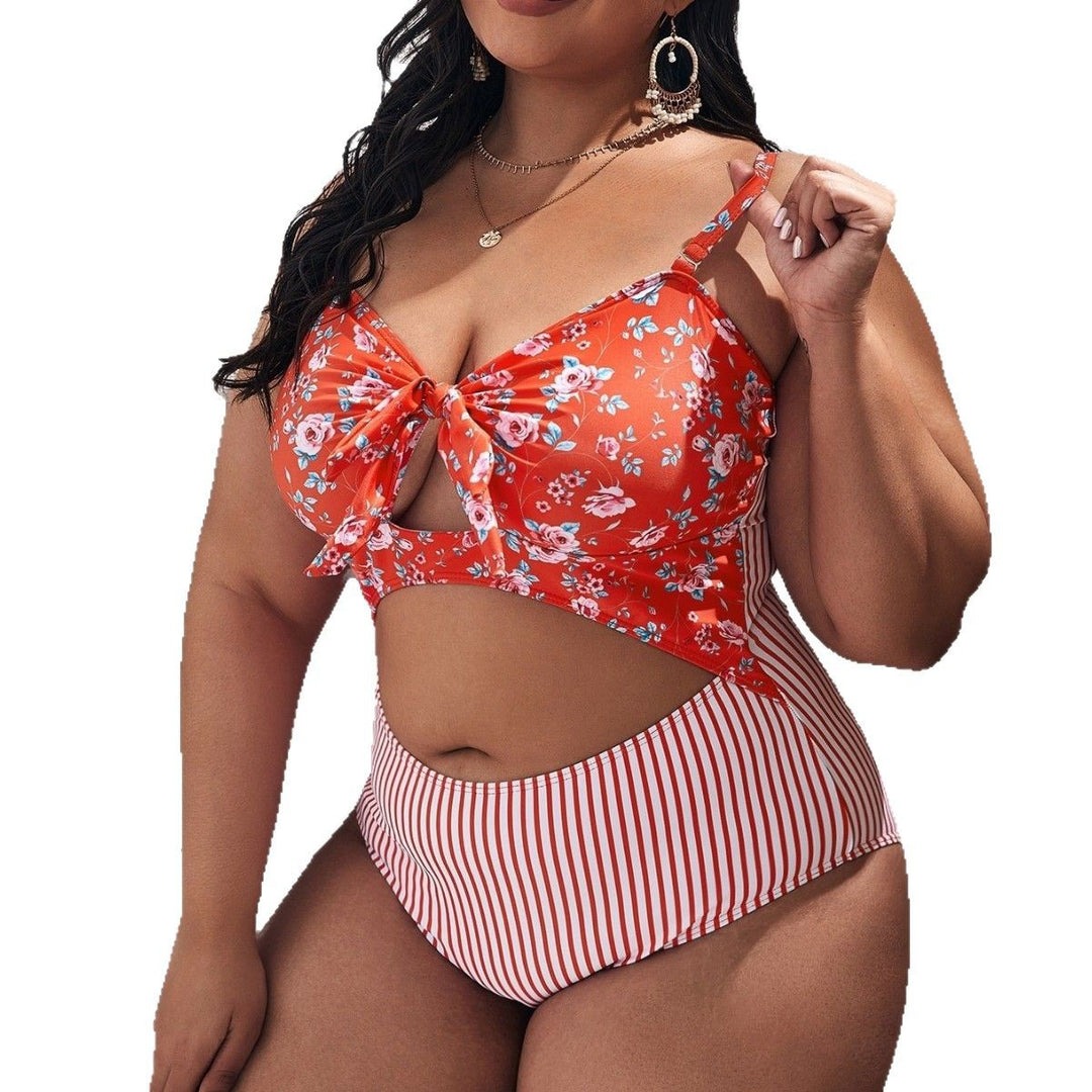 Women's bikini set with playful floral top and striped bottom Mune Fashion