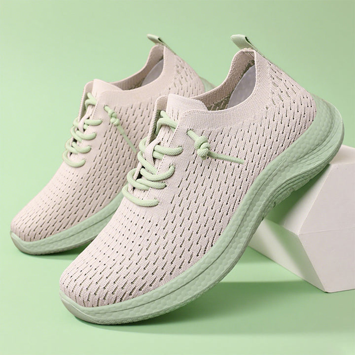Men's breathable knit slip-on sneakers with sock-like shaft, asymmetrical decorative lacing, and cushioned Ortholite insole Mune Fashion
