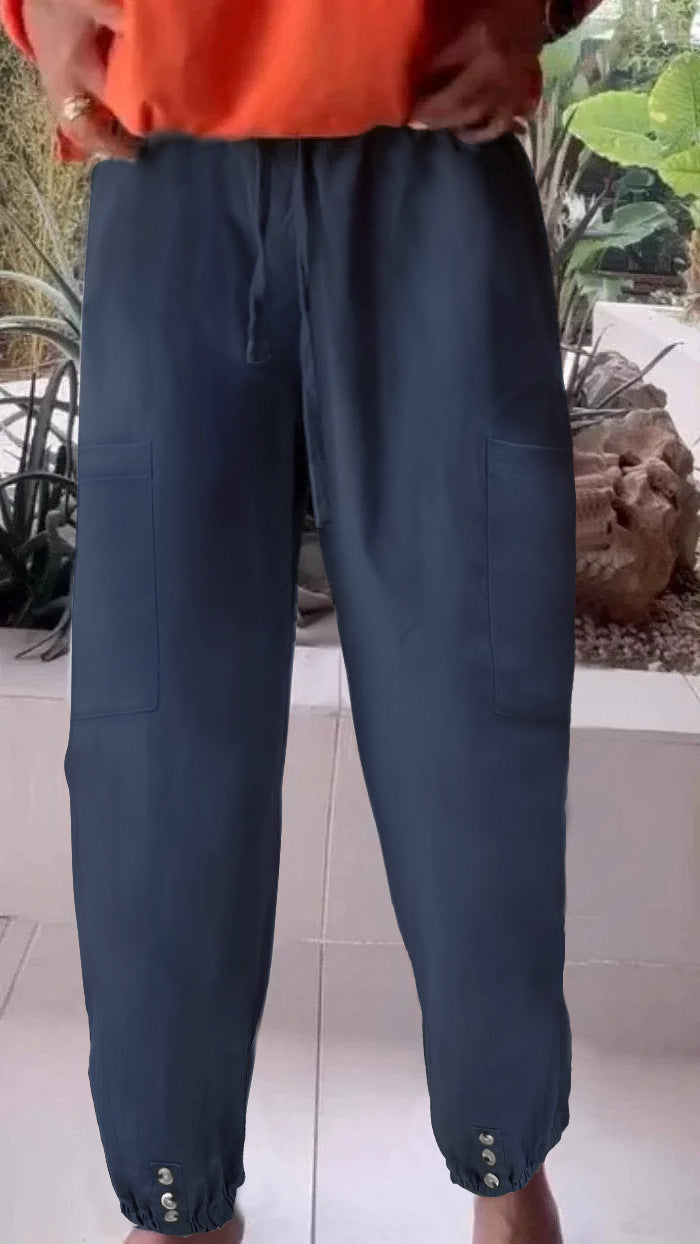 Ladies cargo jogging pants with drawstring, patch pockets and button cuffs Mune Fashion