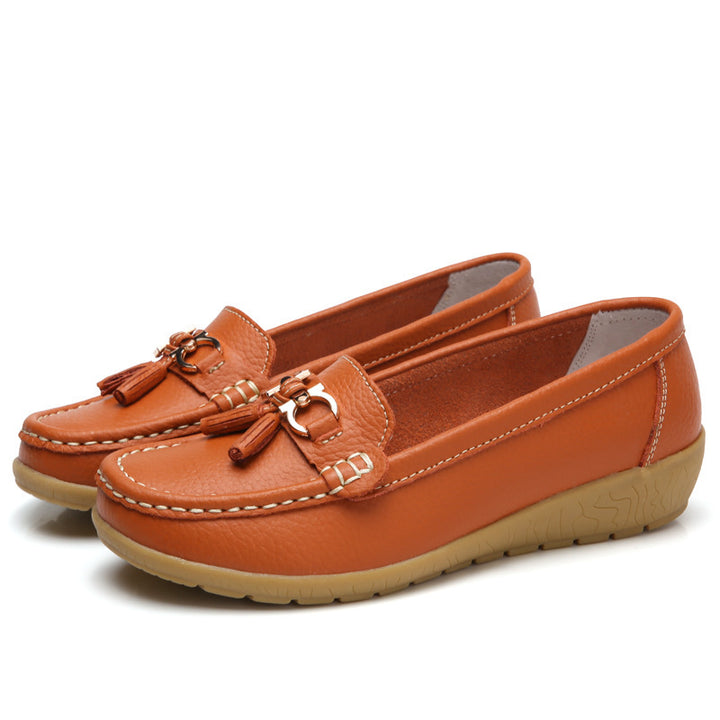 Women's classic tassel moccasin made of textured synthetic leather with padded comfort insole and flexible wedge sole Mune Fashion