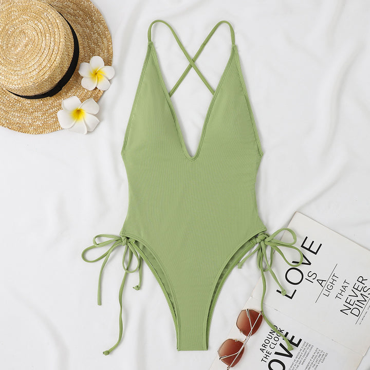Ladies one-piece swimsuit with deep V-neck and adjustable side ties Mune Fashion