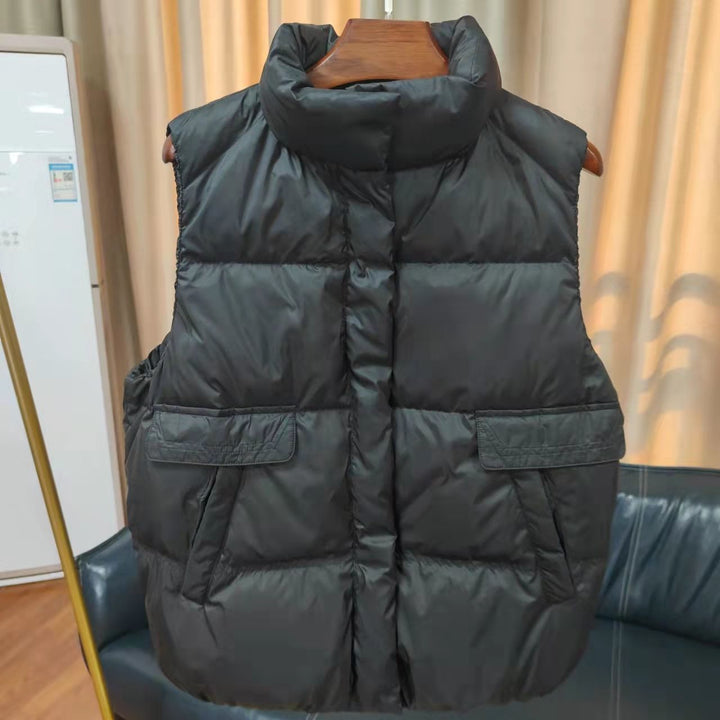 Women's quilted thermal vest with high stand-up collar and patch flap pockets Mune Fashion