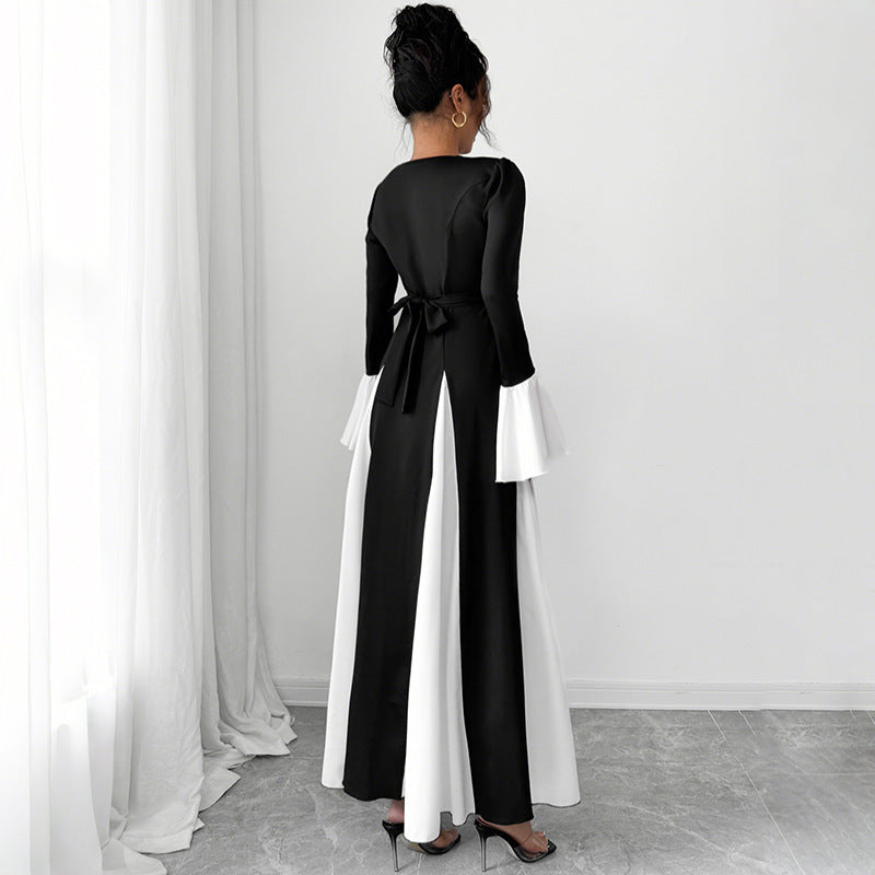 Ladies evening dress with fitted corset top, long sleeves and contrasting flounce cuffs Mune Fashion